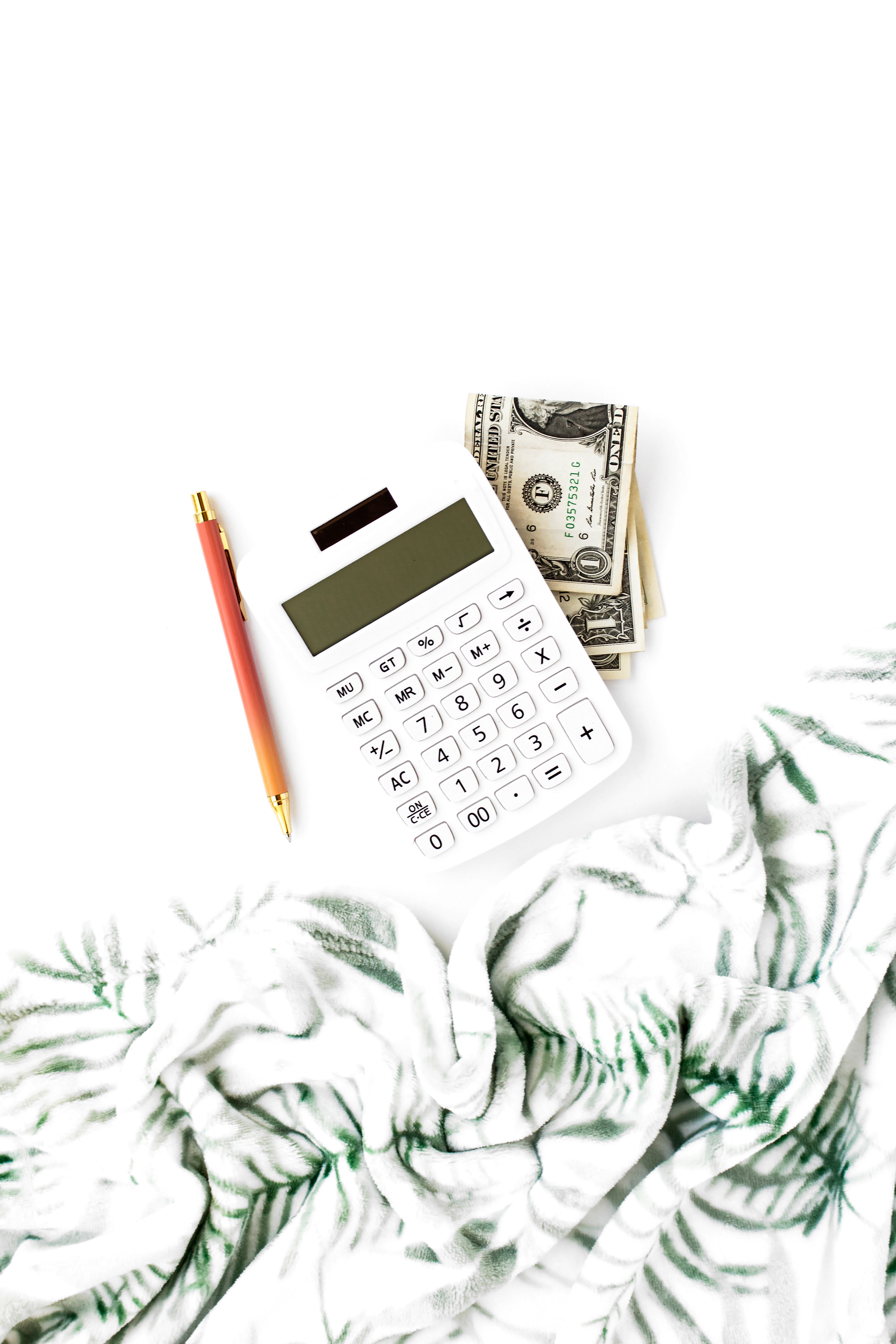 photo of calculator and money