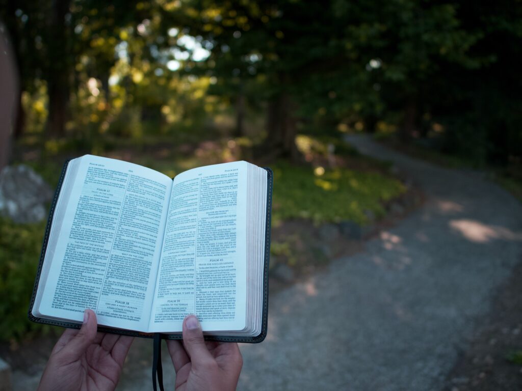 walking with a bible outside