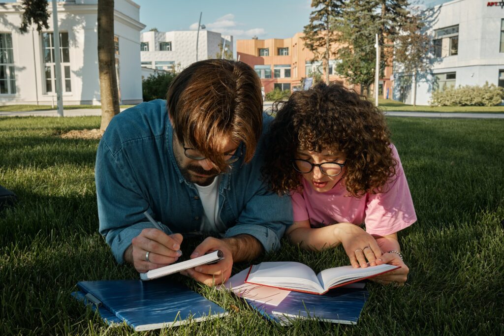 two students reading books