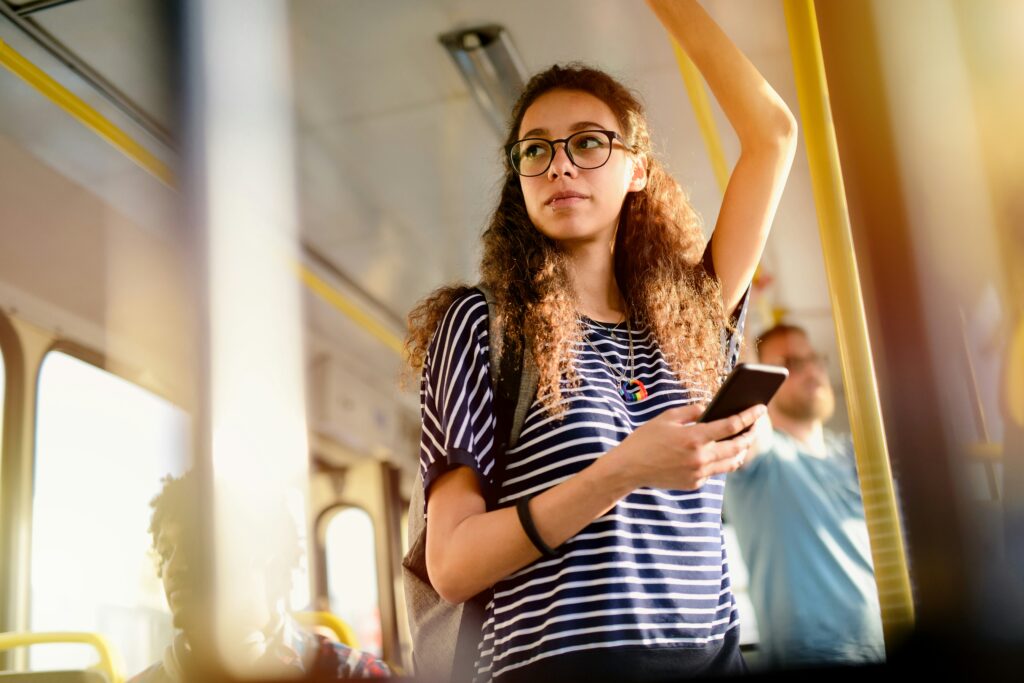 young woman taking transit