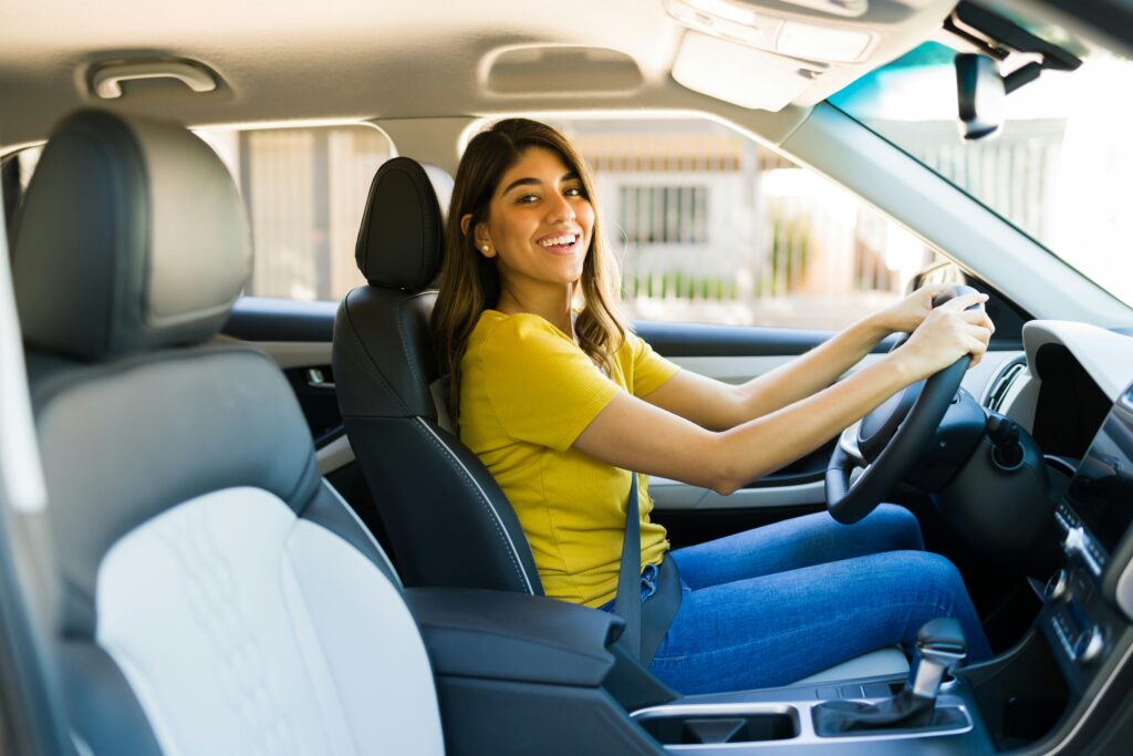 woman driving newly cleaned car