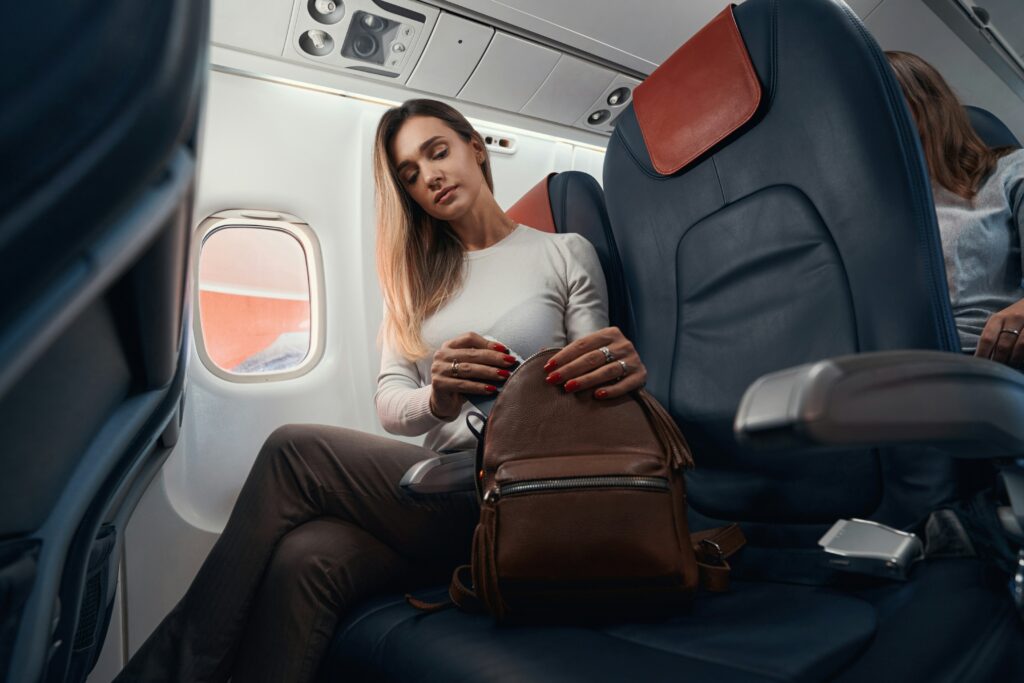 woman putting her phone away