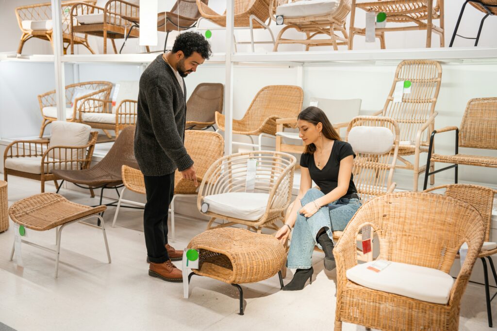 a couple picking out furniture together