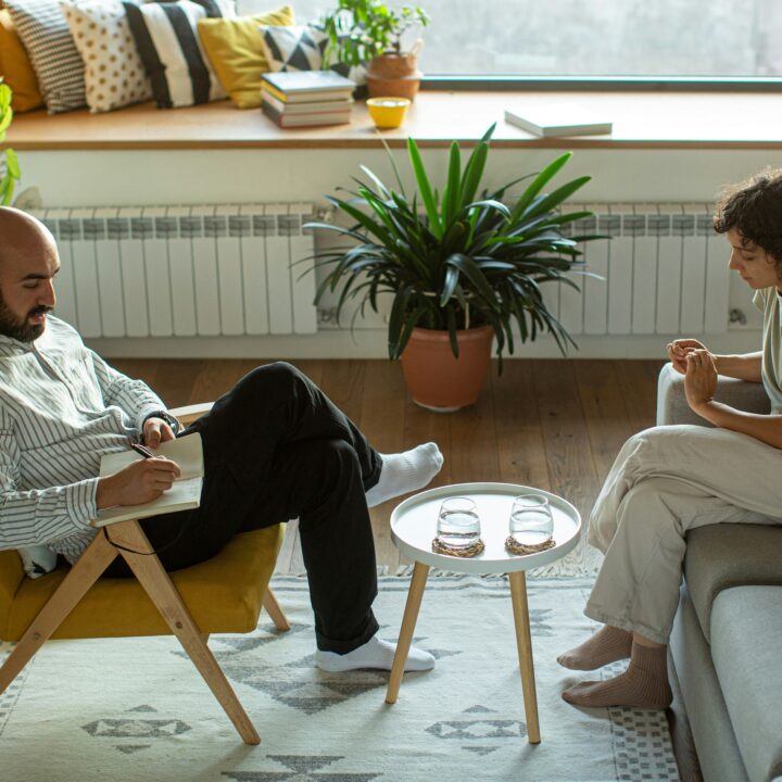 woman talking to male therapist