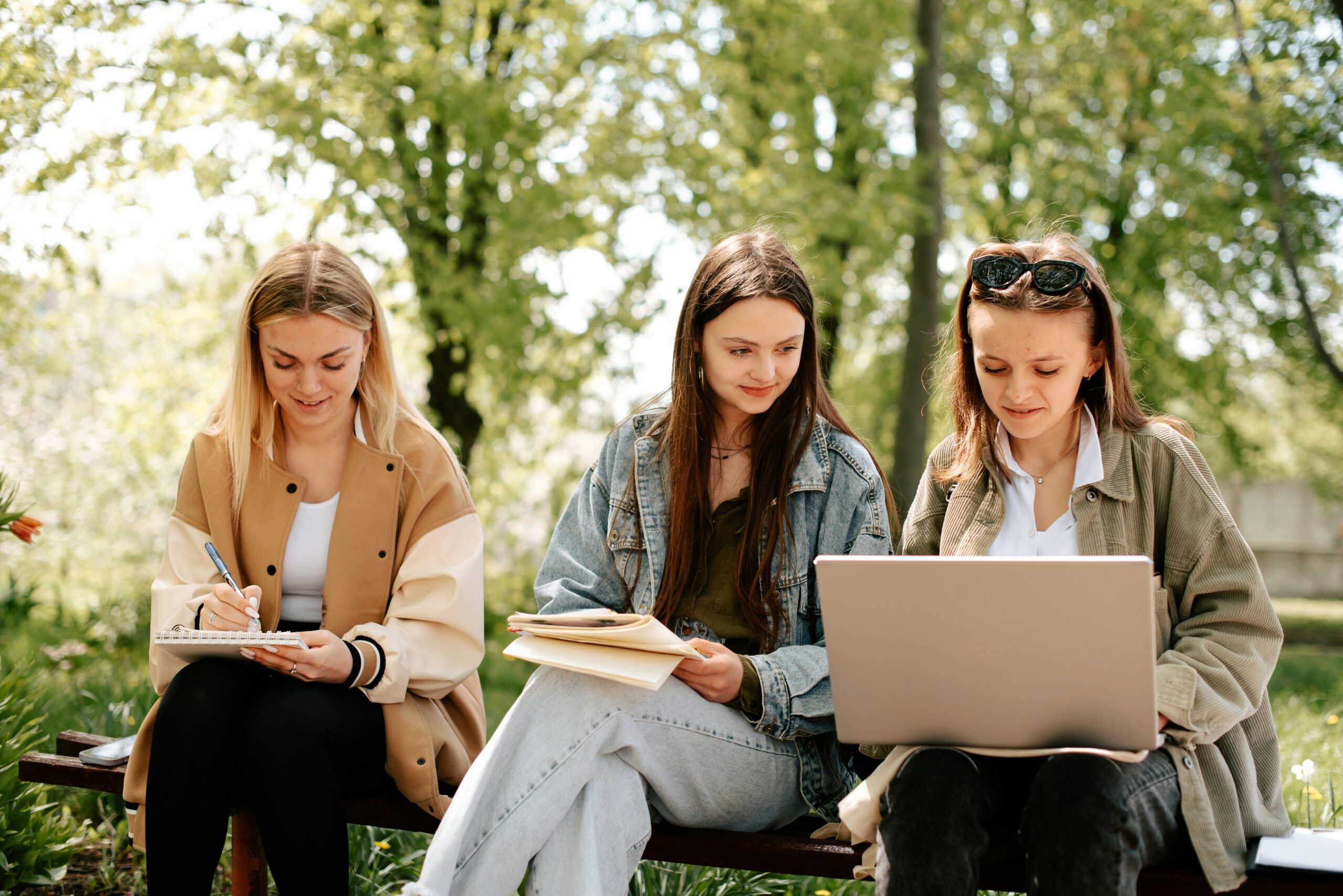 college girls studying outside