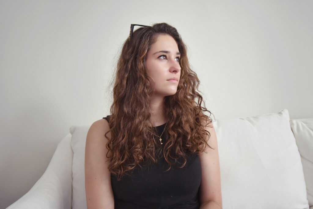 woman contemplating the returns of self-investment