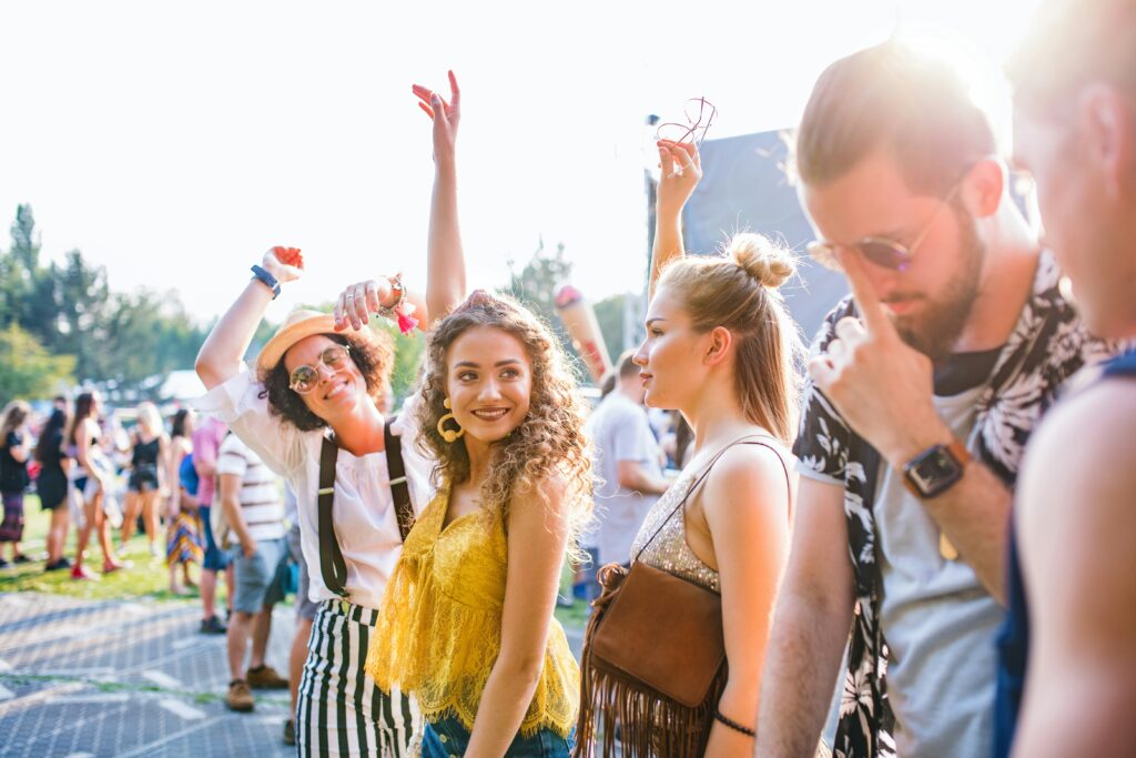 group of friends at a summer outdoor concert