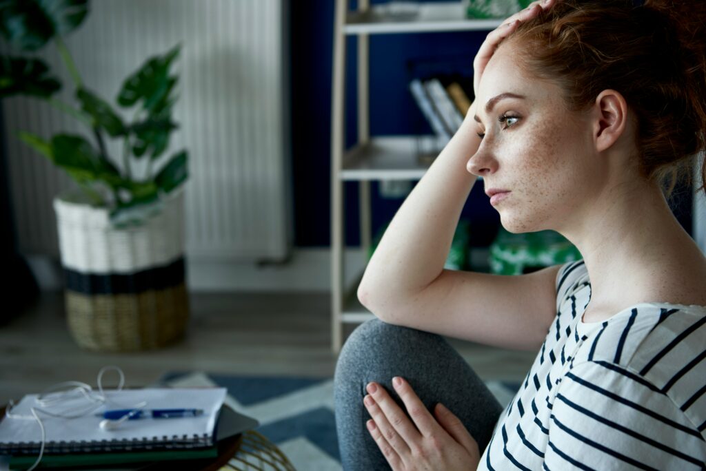 young woman reflecting on her family past