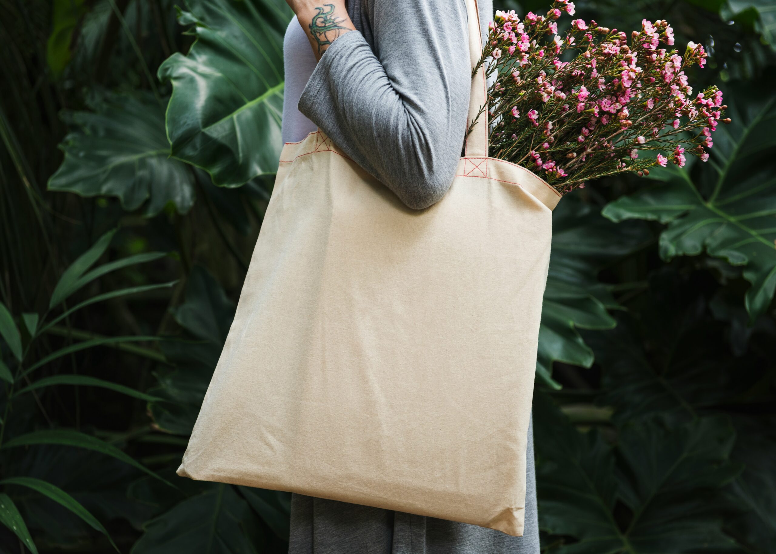 woman carrying a tote bag