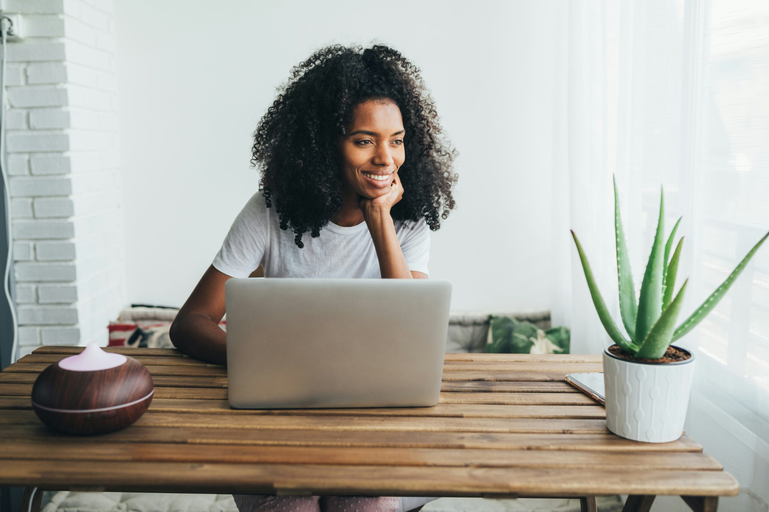 woman typing on computer